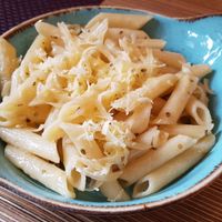 Side: pasta with vegan cheese at Bhajan Cafe in Riga
