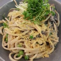 Spaghetti Carbonara: creamy cheese + green peas + mushrooms + green DELICIOUS! at Bhajan Cafe in Riga