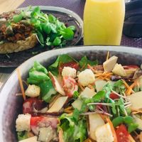 Salad with smoked salad and mango lassi 🥭🥗 at Bhajan Cafe in Riga