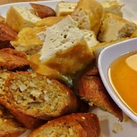 Vegan sausage and deep-fried tofu at Im Jai - Veg Food Stall in Chiang Mai