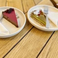 Hibiscus & pomegranate salted chocolate cake (left) and Matcha Mango Pie  at Naspolya Nassolda in Budapest