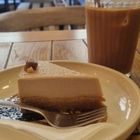 Caramel chai spice cake and old gorilla drink at Naspolya Nassolda in Budapest