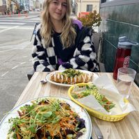 Vegan breakfast burrito, raw salad, raw collard leaf wrap  at Judahlicious in San Francisco