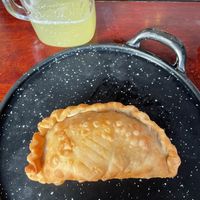 Empanada de elote y agua de guayaba   at U.to.pi.a in Mexico City