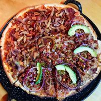 Pizza with smoked coconut „bacon“ & meat lovers at U.to.pi.a in Mexico City