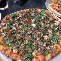Vegan pizza with sauteed mushrooms, spinach, onions and vegan ricotta.  at Salvatore's  in Halifax