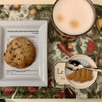 Latte with oat milk & Chocolate pecan cookie & little square of PB cookie  at Le Botaniste in Ghent