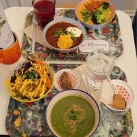 Different small bowls for trying everything at Le Botaniste in Ghent