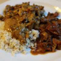 Hot food from the buffet - mock meat in pepper sauce, and tofu with champignons.  at Country Life Restaurant in Prague