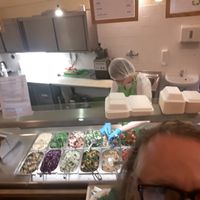 Here is a glance at the delicious saladbar.... Just look behind my bold head at Country Life Restaurant in Prague