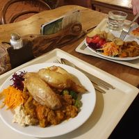 Potato wedges and soya pumpkin dish with salad at Country Life Restaurant in Prague