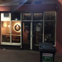 outside at night  at De Hummus House - Sint Antoniesbreestraat in Amsterdam