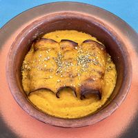 Aubergine cannelloni stuffed with vegetables in carrot and zuchcini sauce  at Fang i Aram in Menorca