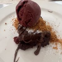 Vegan chocolate brownie with blueberry ice cream  at Fang i Aram in Menorca