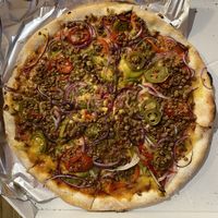 Pizza Vege bolognese with vegan cheese and extra jalapeños.  at Tottapizza in Maribor