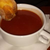 tomatoe soup and bread  at Pizzeria Manna in Prague