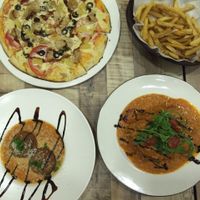 BBQ Chicken pizza, they add more cheese here than at Sin Ming?

Truffle fries, comes with vegan parmesan. Very yummy :) at Brownice Italian Bistro in East Singapore