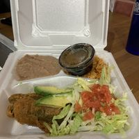 Avocado relleno with vegan refried beans, rice and side of salsa  at La Salita in Albuquerque