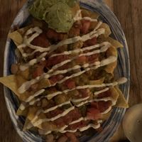 Nacho supreme - minus onions and jalapeños   at The Burrowing Owl in Colorado Springs