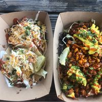 Meal on the right is for my Vegan self (veggie taco, take off white sauce add avocado) and my non vegan boyfriend got blacken Mahi mahi fish tacos. It was a perfect place for us!  at Finn's Island Style Grub in Panama City Beach