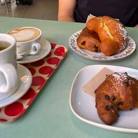 The, cappuccino di soia, pan brioche con gocce di cioccolato, pan brioche con crema al pistacchio e pan au chocolat   at Fram Cafe in Bologna