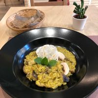 Mushroom and curcuma risotto at O'Vita in Parma