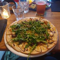 Pizza blanc with caramelised onions and arugula. at Crippas Cafe in Gothenburg