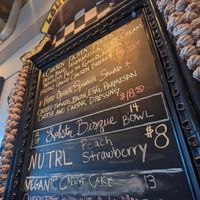 Vegan carrot cake on their daily menu board! at Louisiana Pizza Kitchen in New Orleans
