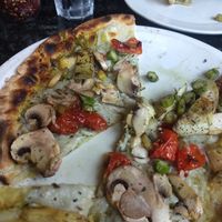 It doesn't look cheesy but the balance of flavors is great.  at Louisiana Pizza Kitchen in New Orleans