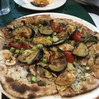 Four seasons pizza with added eggplant on wheat crust and made vegan  at Louisiana Pizza Kitchen in New Orleans