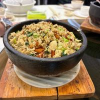 Clay pot rice dish good for sharing   at Light Vegetarian Restaurant in Kowloon