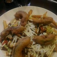 loaded fries with beer battered avocado  at Pancho's Kitchen in Las Vegas