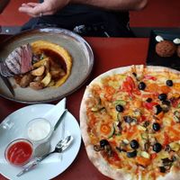 Vegan pizza, mayo & falafel. (Meat dish is steak and pumpkin puree) at Kavarna Klubu Cross in Prague