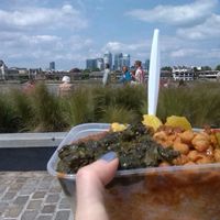 Mixed box with rice by the River Thames. Comforting and tasty. Spiced up with Red and Green Chilli sauces. at Red Tent Ethiopia in South East London