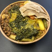 Five curries with injera and chilli relish  at Red Tent Ethiopia in South East London