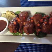 vegan chick'n wings with spicy BBQ sauce  at Equelecua Cuban Cafe - Cloud Kitchen in Los Angeles