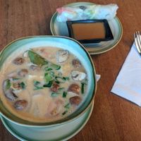 great coconut milk soup and a summer roll with peanut sauce at Soy in Berlin