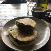 Vegan toastie - 15 dollars, and oat flat white   at Livefast Cafe in Halls Gap
