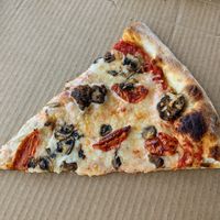 Vegan cheese and meatballs with sun-dried tomatoes and mushrooms. at Whole Foods Market - Domains Dr in Austin