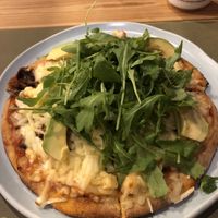 Hula Queen - with pineapple, arugola, dried tomato, corn, avo, mushrooms  at BodhiGreen Vegetariano in Alicante