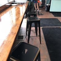 Stool seating area inside, 8 total. at The Holy Donut - Park Ave in Portland