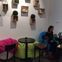 Cozy seating area at The Raw Deli in Prague