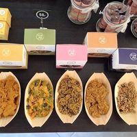 Samples to try for free: Different raw stuff to buy/take away: crackers, chips, granolas... at The Raw Deli in Prague