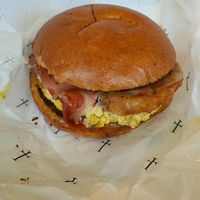 Bacon and egg roll with hash brown at Smith & Deli in Collingwood