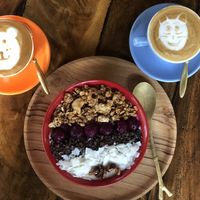 Smoothie bowl and cappuccino  at Smoothie Shop in Jimbaran
