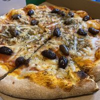 Margherita with olives and vegan cheese  at La Bocca in Budgewoi