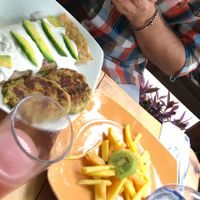fresh fruits and veggie burgers  at El Vegano Andante in Medellin