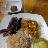 Seitán sticks w/BBQ sauce, salad, coco-rice, plantain slice w/guacamole at El Vegano Andante in Medellin