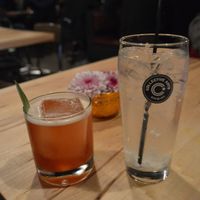 Wagtails & Pipits cocktail (left) and roasted coconut water (right). Yum! at Sabai Sabai in Toronto