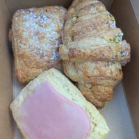 Pain au chocolat, pistachio croissant, strawberry frosted scone. at Passion Flour Patisserie in Salt Lake City
